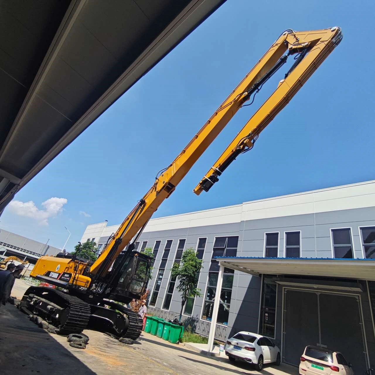 three demolition boom 