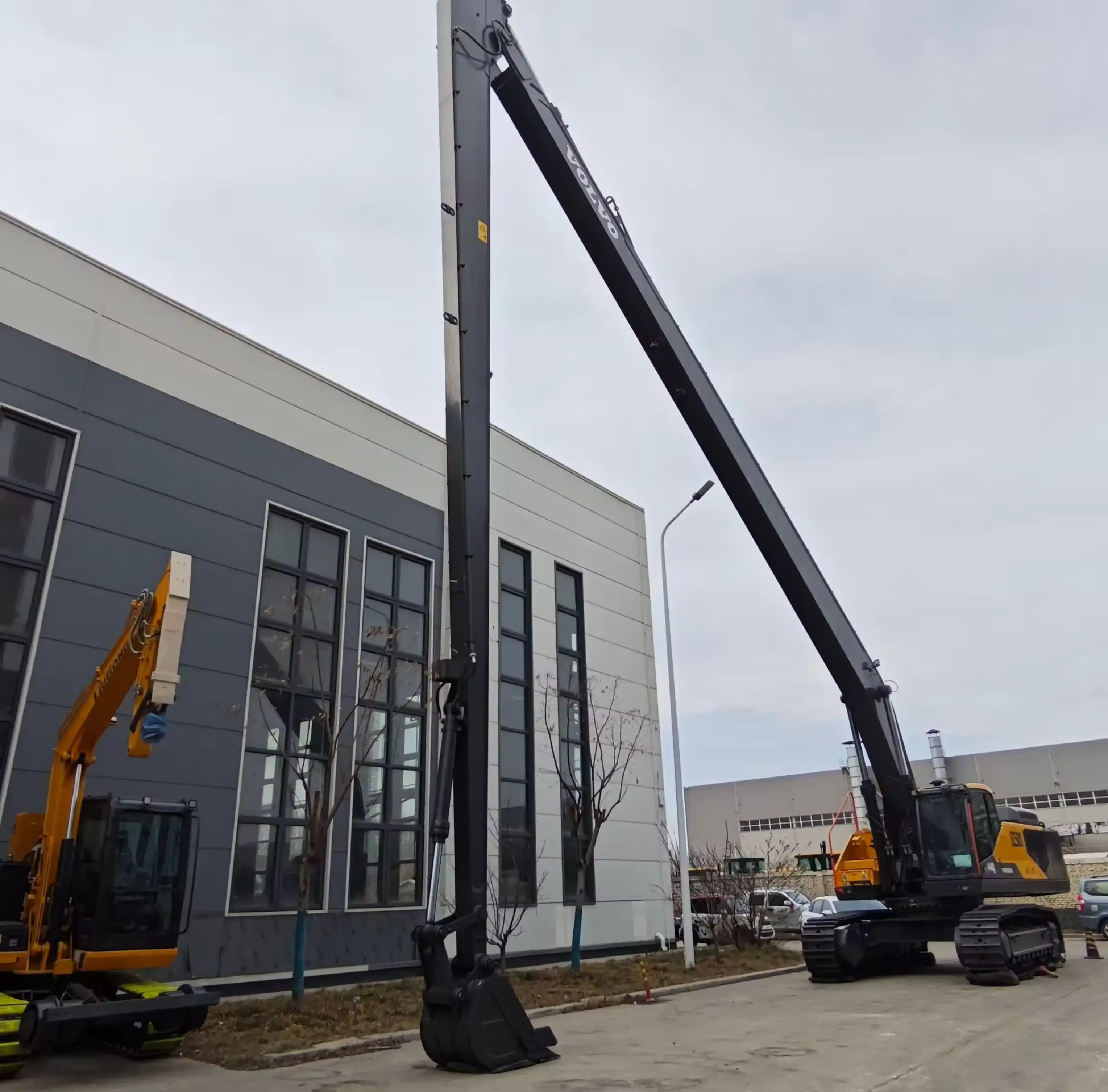 Long reach arm and boom Long reach arm and boom