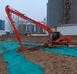 Long reach arm and boom Long reach arm and boom