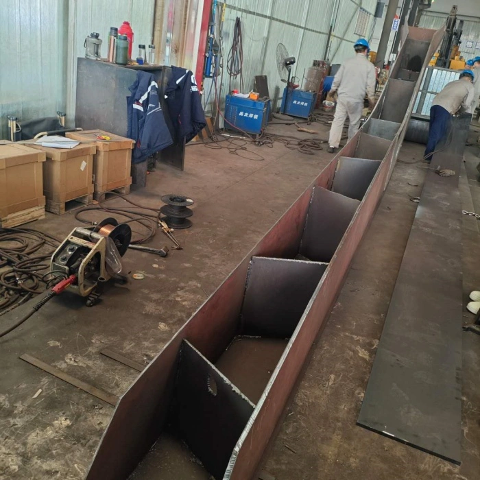 Long reach arm and boom