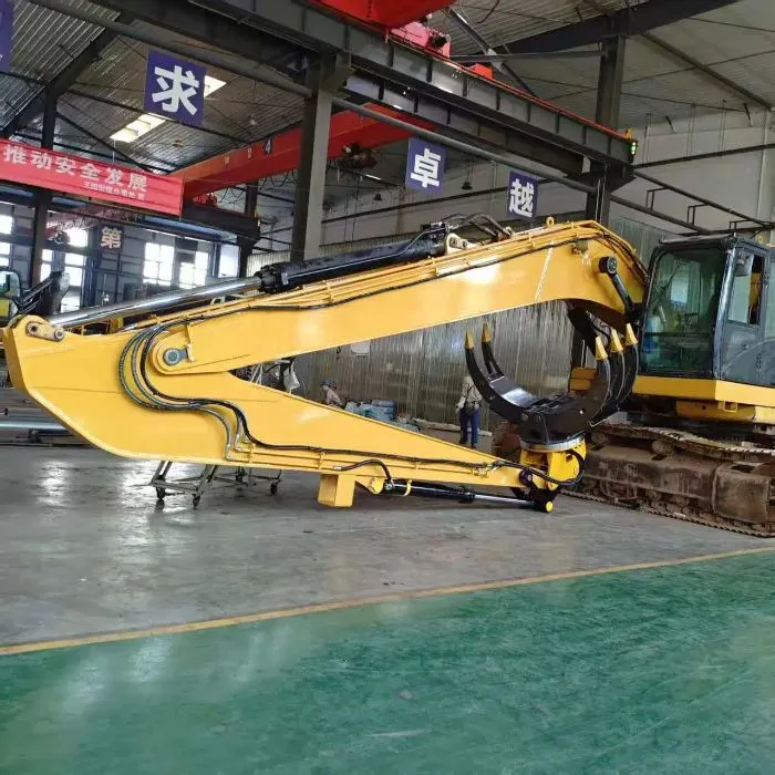 Long reach arm and boom