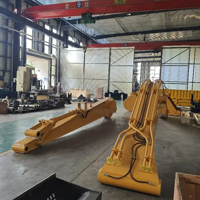 Long reach arm and boom