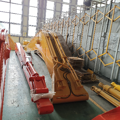 Long reach arm and boom