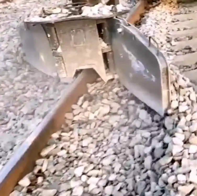 How does the railway excavator ballast plow improve track maintenance efficiency?