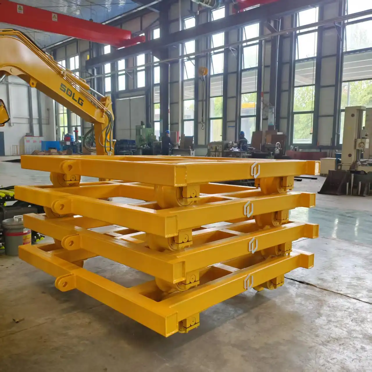 What is the mechanism of a track trolley?