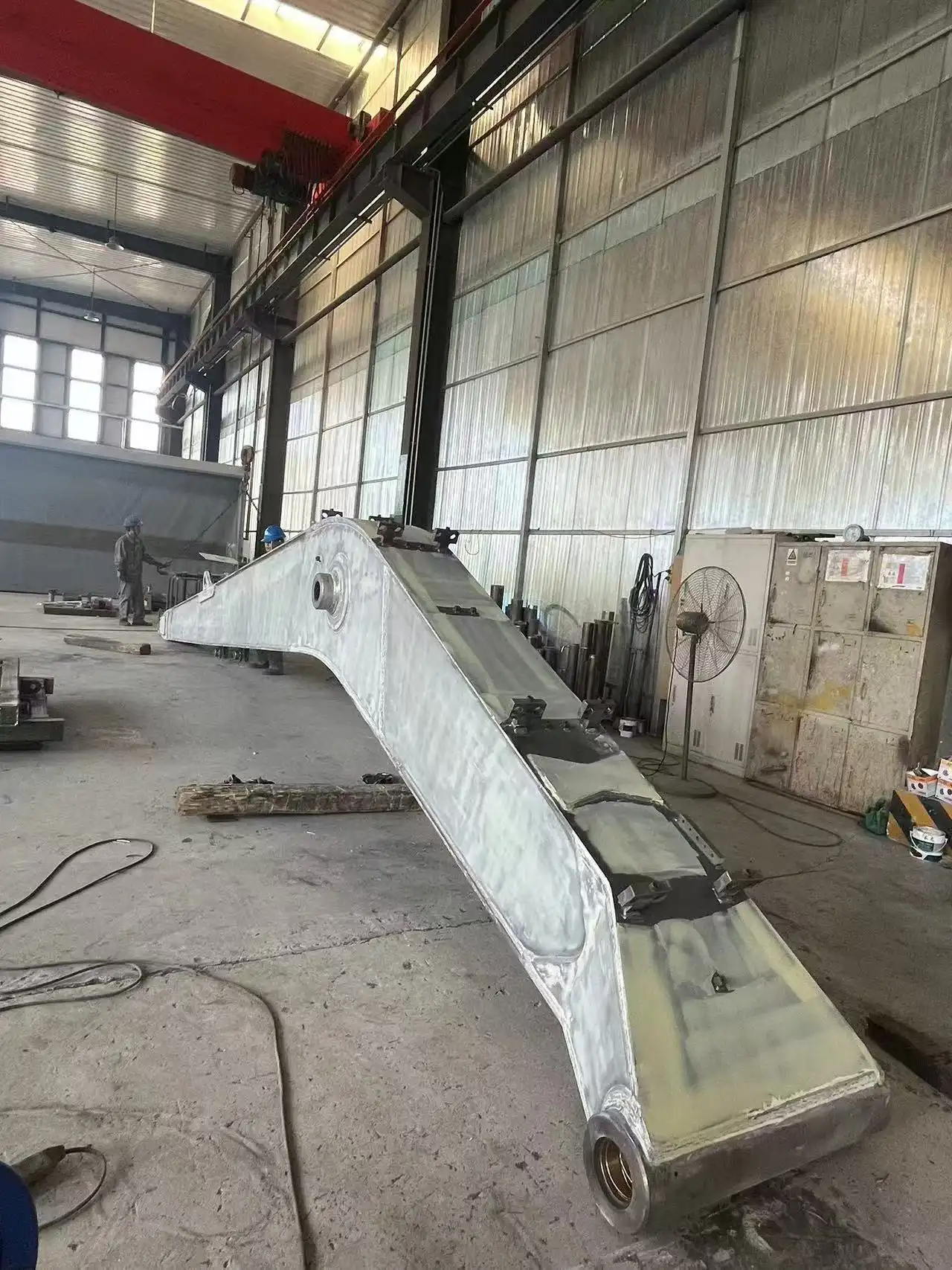 What is the reach of a excavator extension arm?