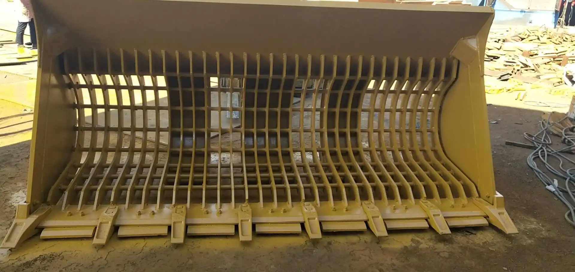 How much does a front loader bucket hold?