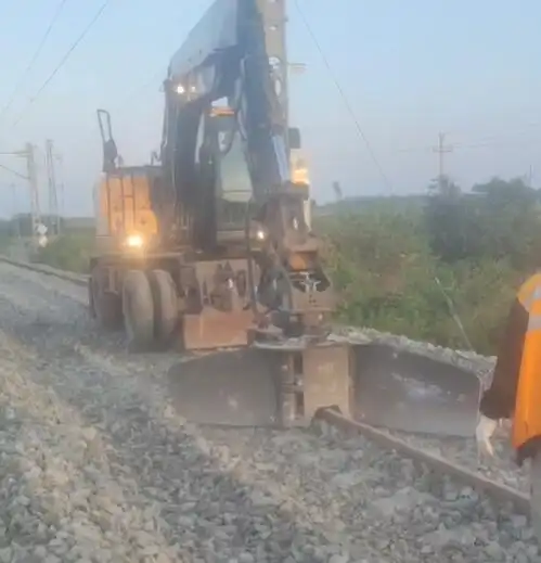 What is the maximum width and height of the railway excavator ballast plow?