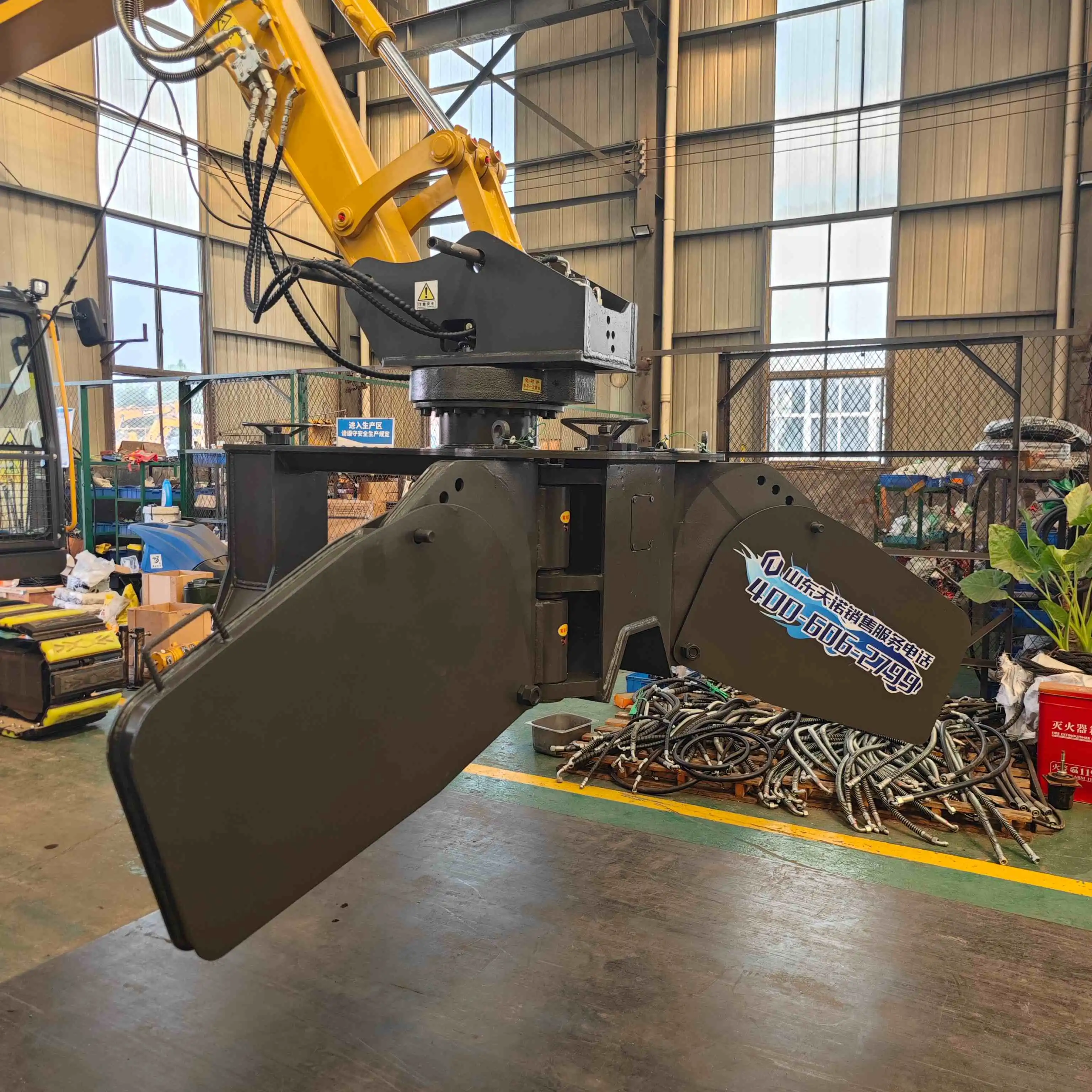 How does the railway excavator ballast plow adapt to clearing and shaping ballast alongside rails?