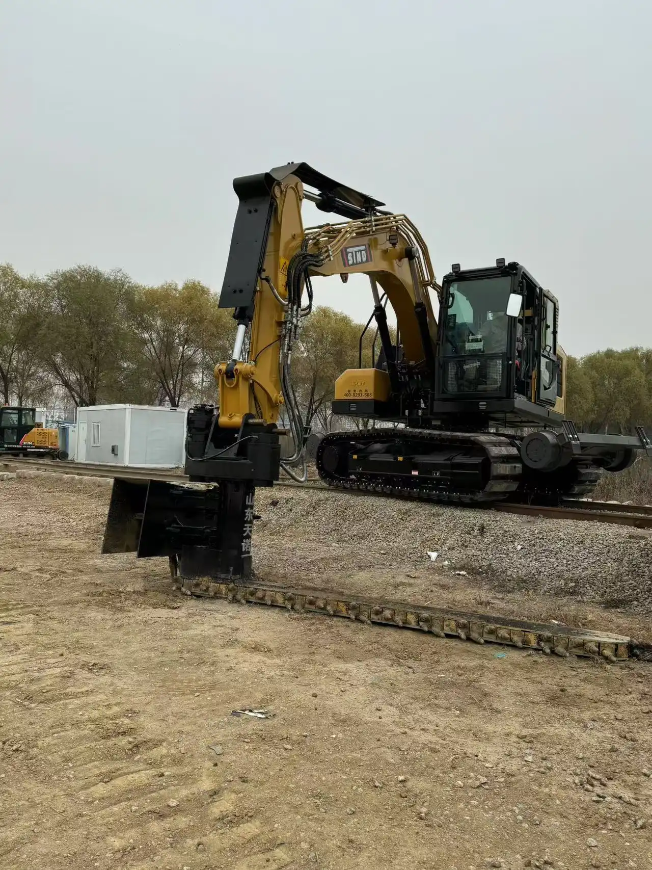 What is the effective cleaning length of the ballast blaster undercutter?