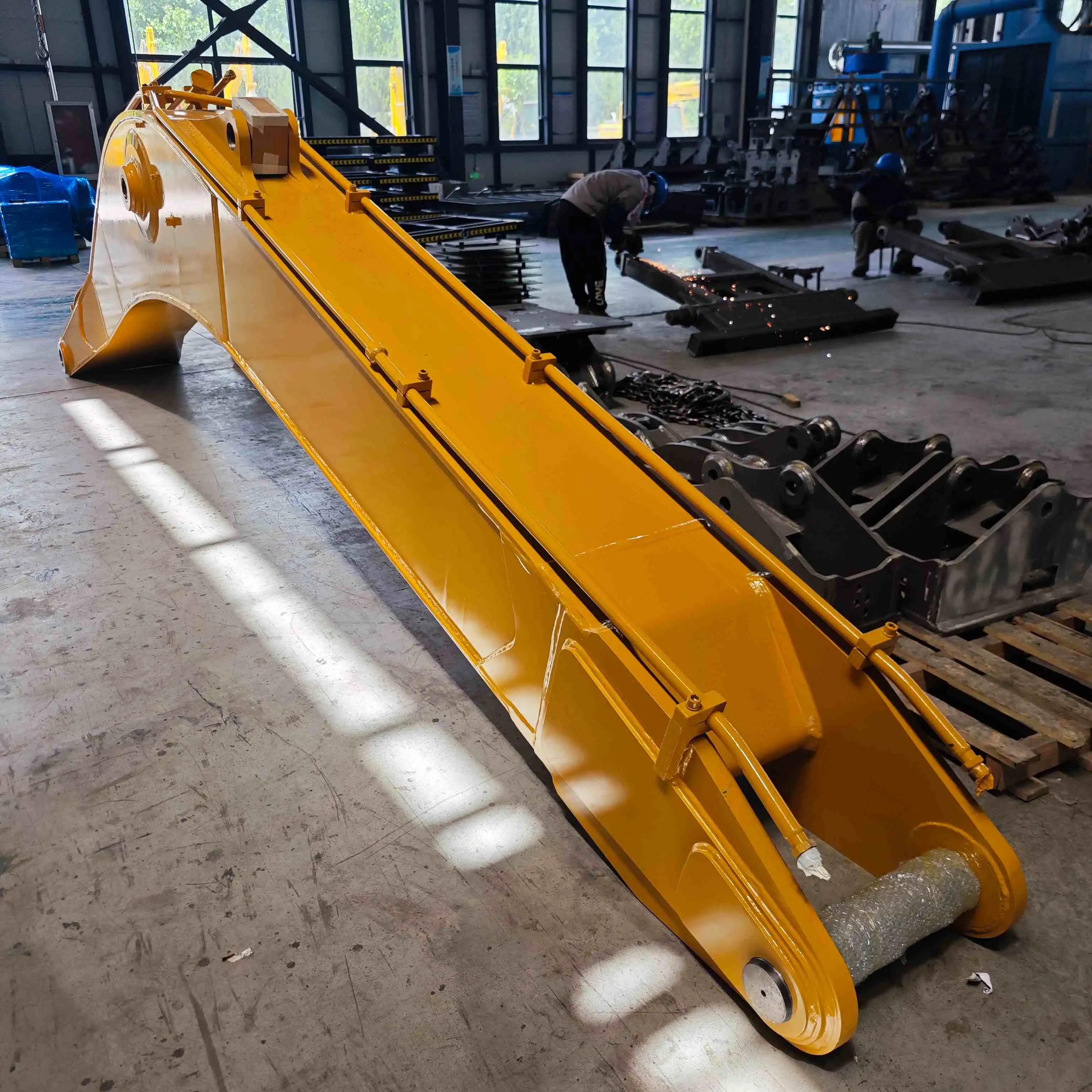What is the standard size excavator boom and arm maximum reach?