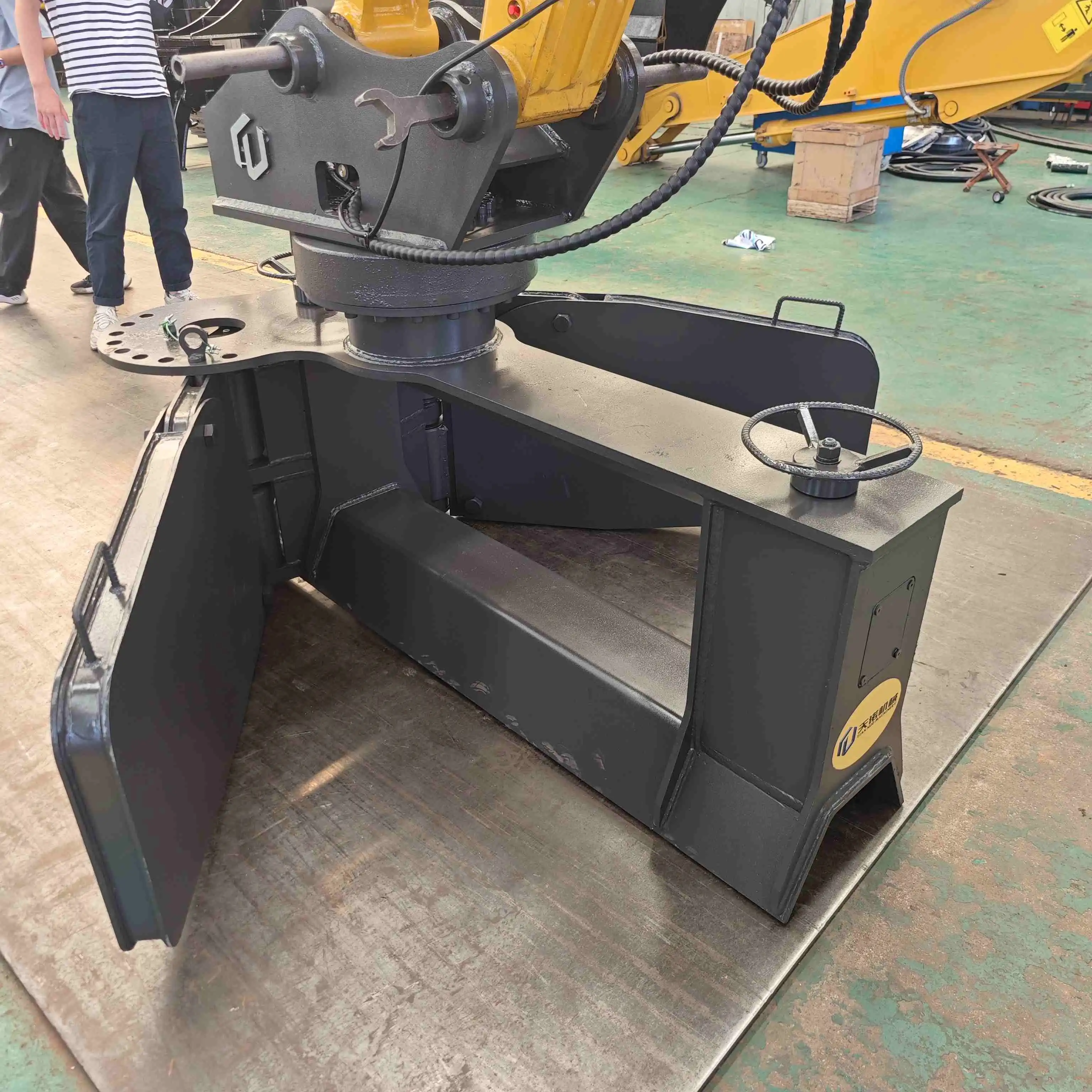 How does a railway excavator ballast plow differ from other types of ballast maintenance equipment?