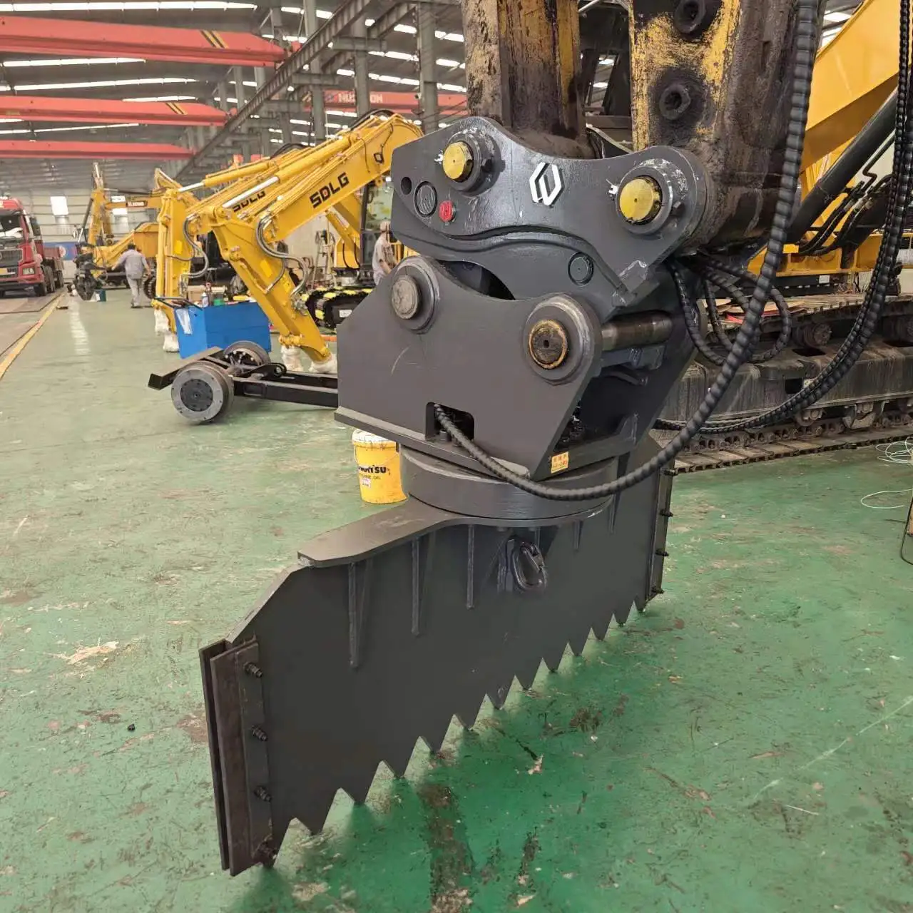 What size excavator is compatible with a rotating scraper attachment?